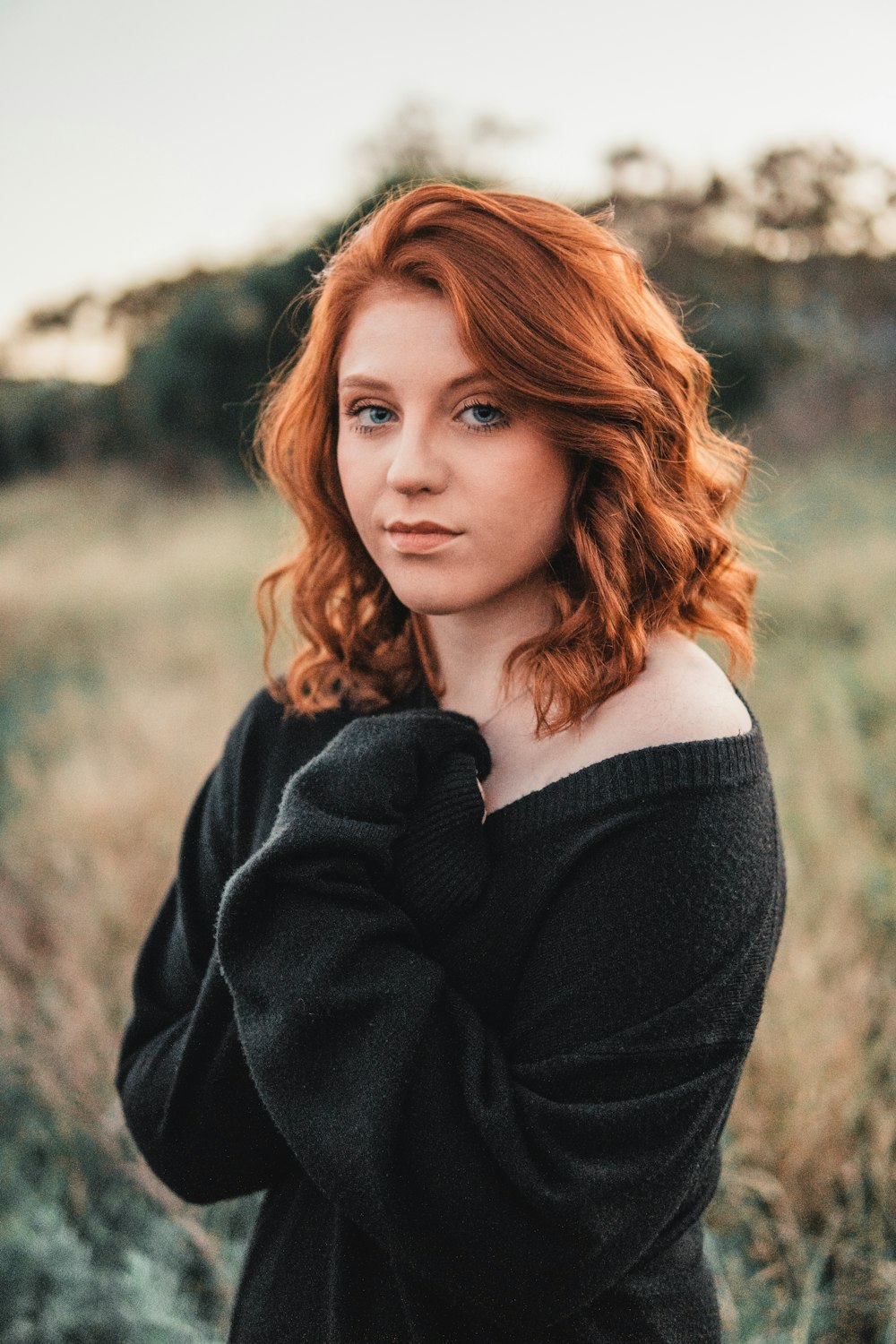 woman wearing black sweater