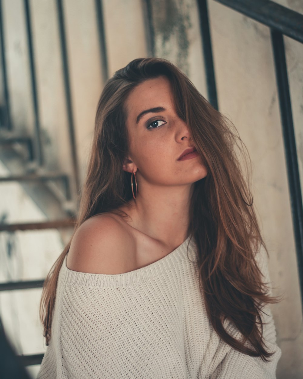 woman sitting on staircase