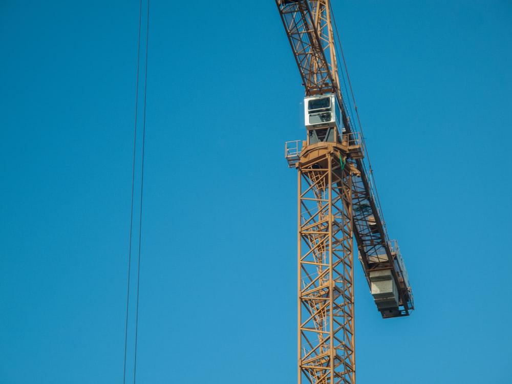 yellow tower crane