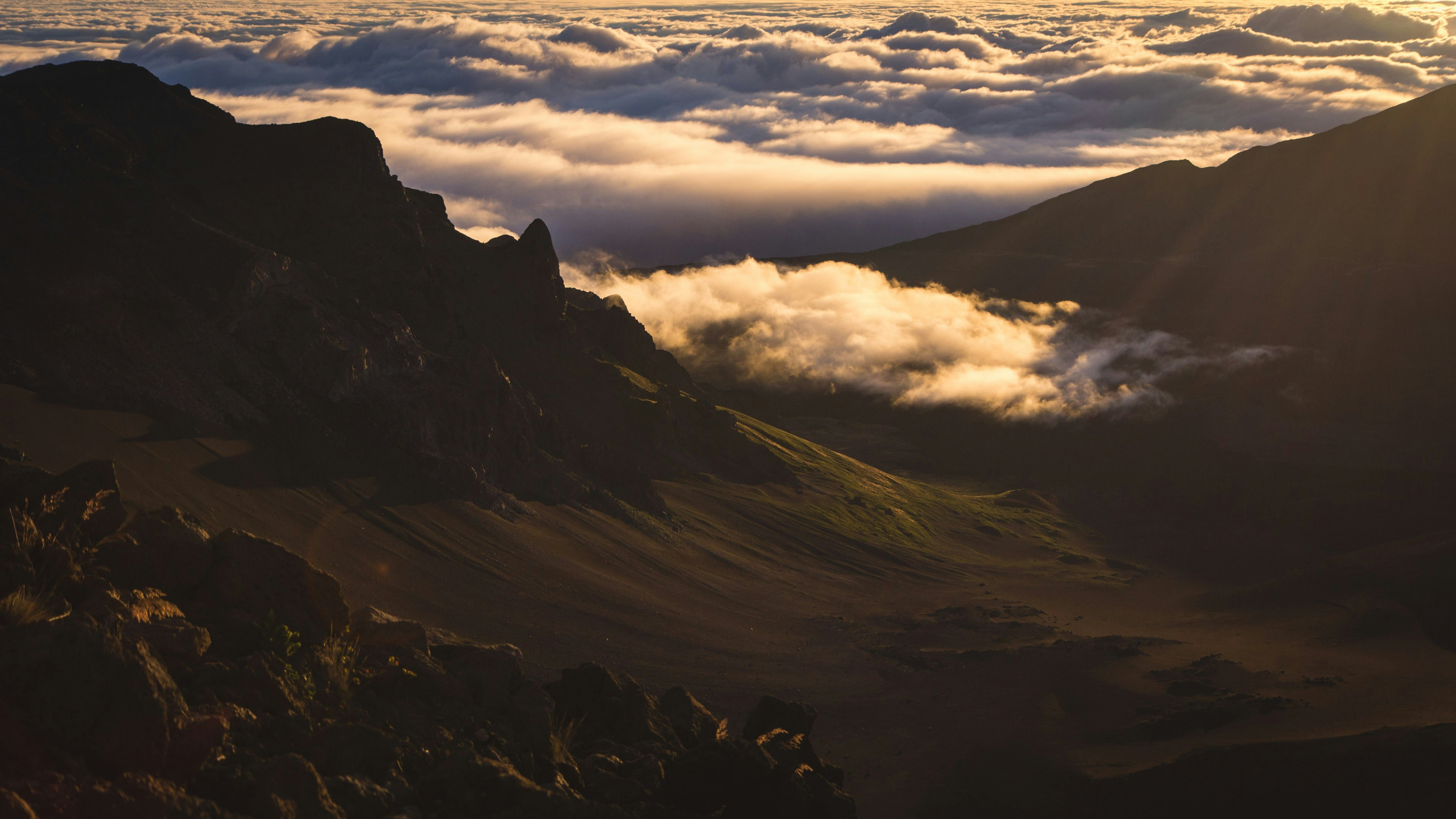 white clouds across mountain