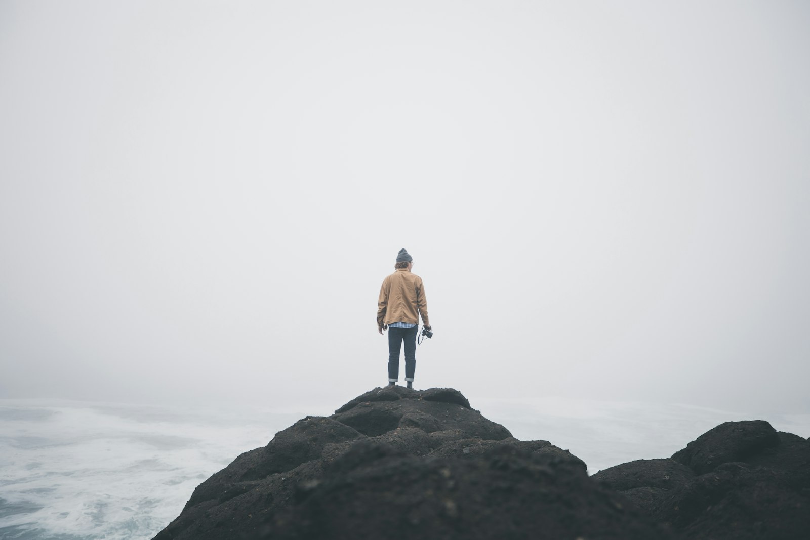 Canon EF 16-35mm F2.8L III USM sample photo. Man standing on rocky photography