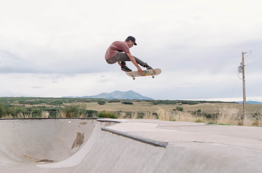 man riding skateboard in air during daytime in Carbondale United States