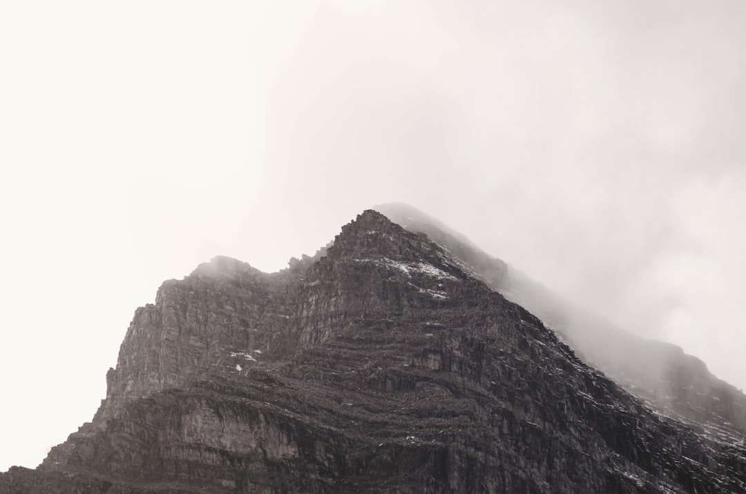 mountain under white clouds