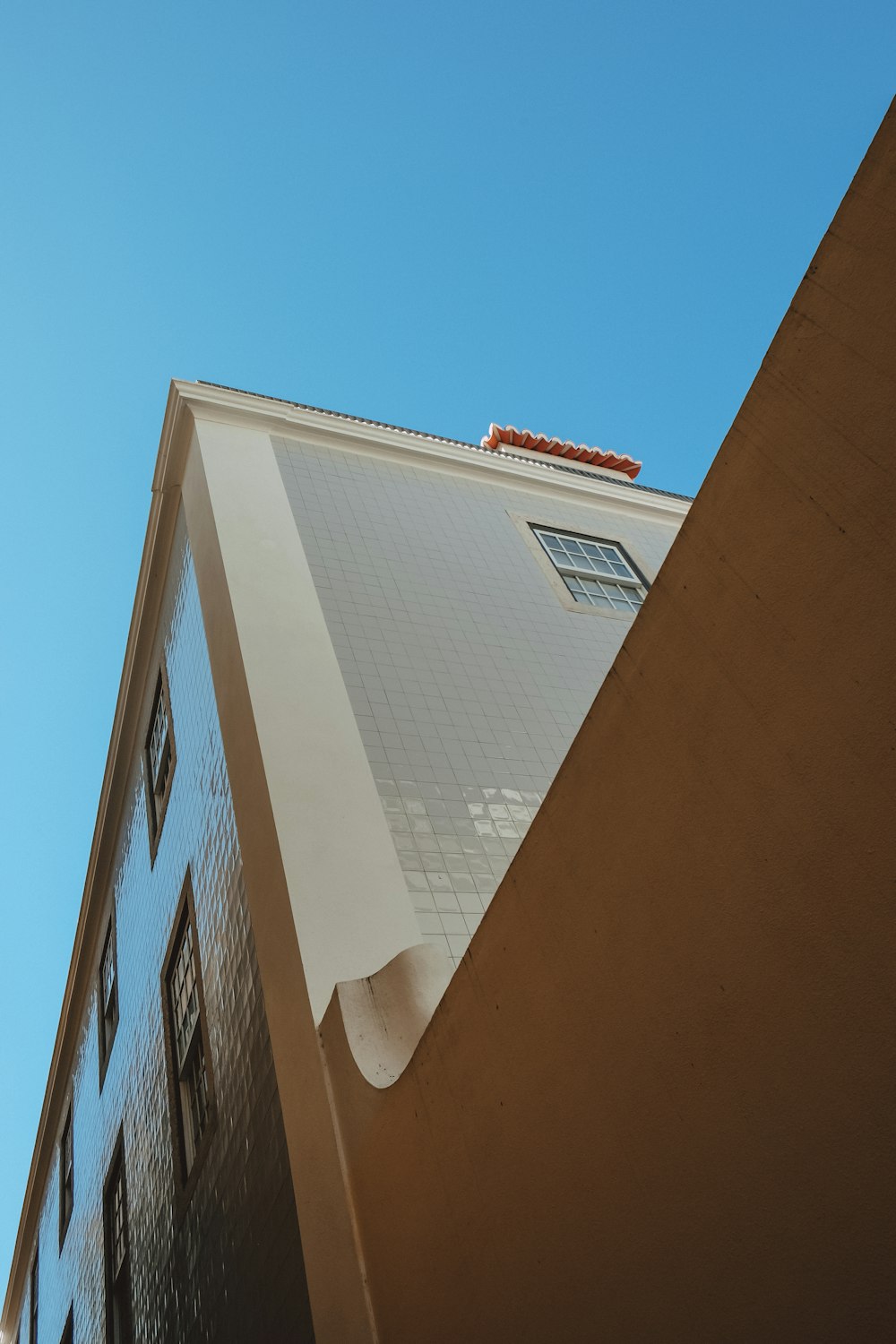 low angle photography of brown building