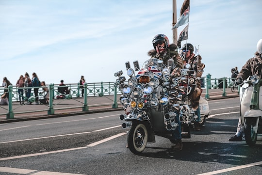 three men riding motorcycles in Brighton United Kingdom