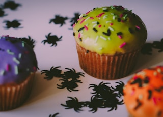 three assorted-flavor cupcakes