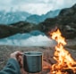 person holding mug