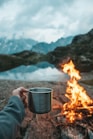 person holding mug