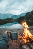 person holding mug