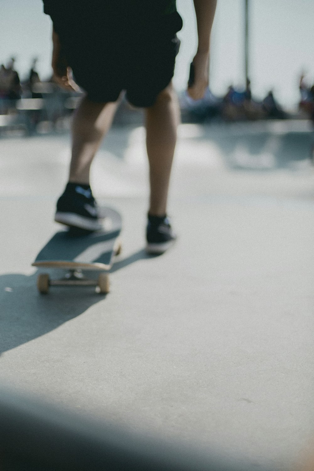 person about to ride skateboard