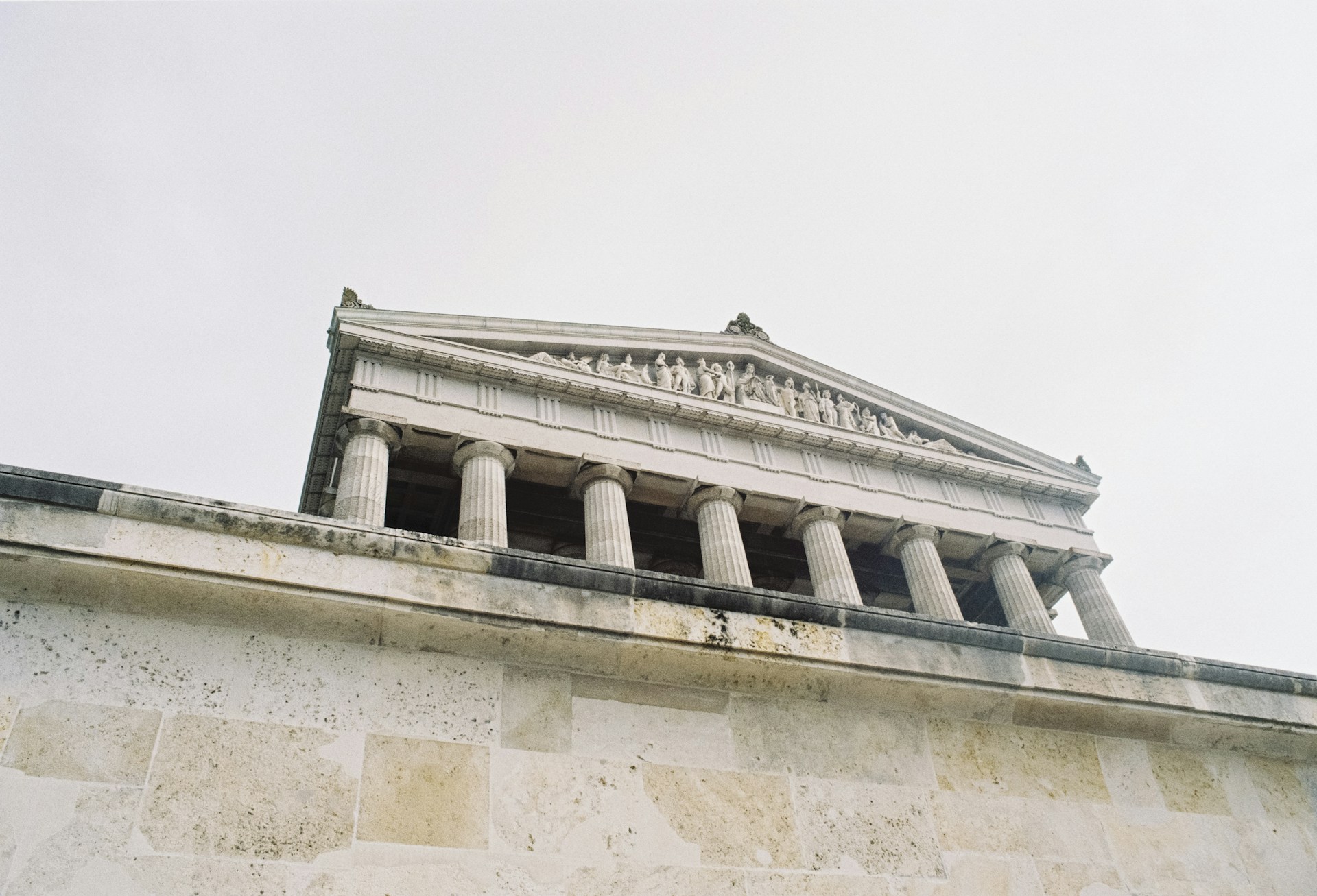 white building with columnds