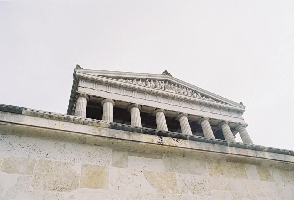 white building with columnds