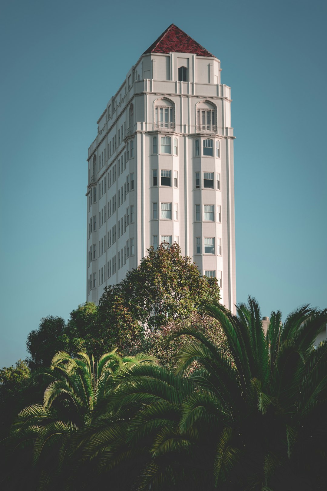 white concrete high-rise building during daytime