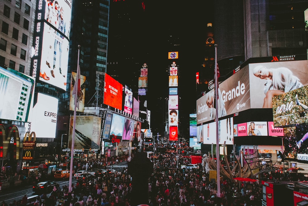 people on street in New York Time Square during nighttime