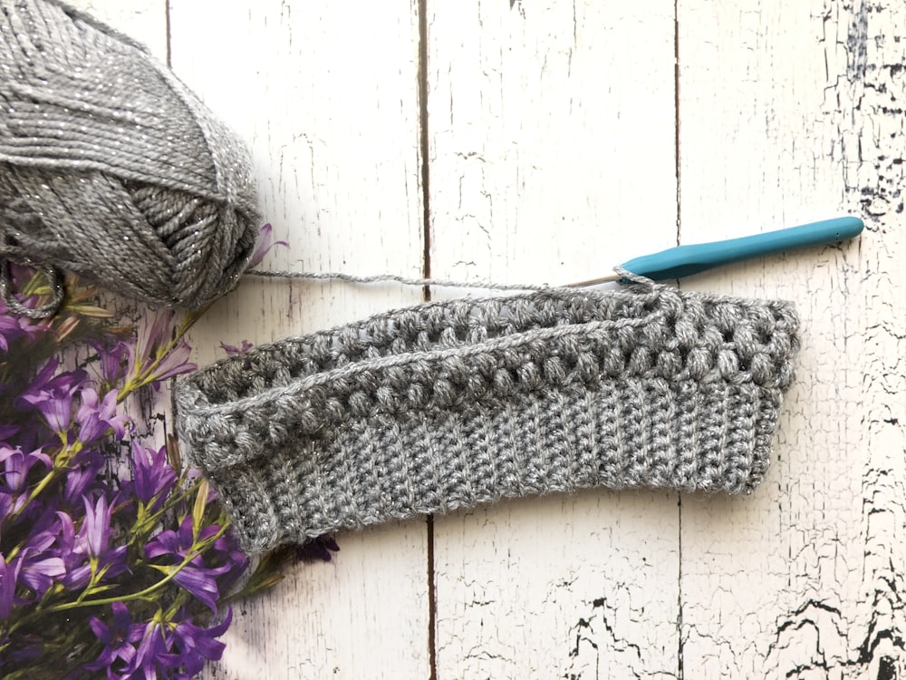 gray knit textile and gray yard