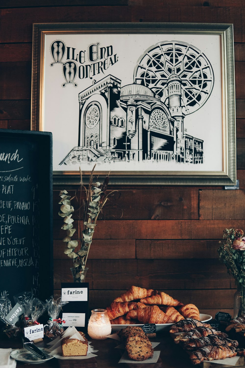 rectangular gray metal photo frame over the pastries