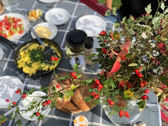 A beautifully arranged wild table setting featuring seasonal ingredients.