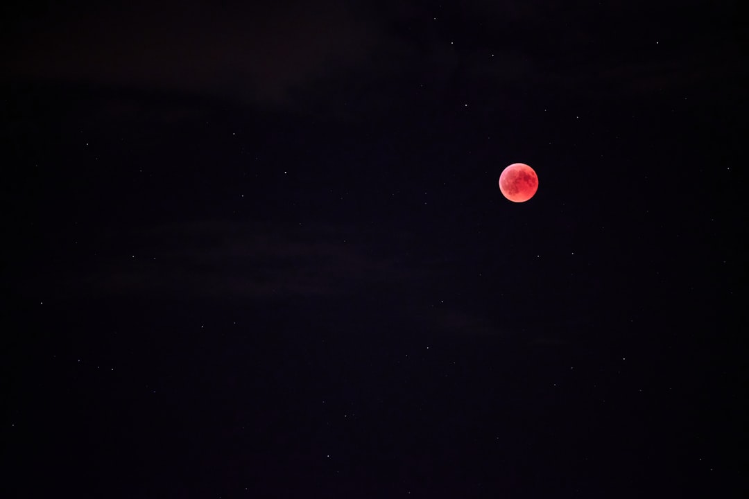 red full moon at nighttime
