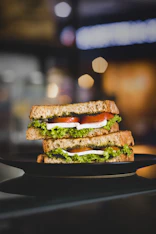 black plate with sandwich