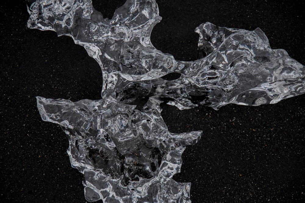 a piece of ice on a black background