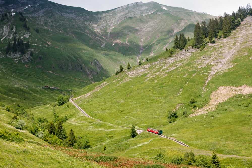 green mountains under clear blue sky