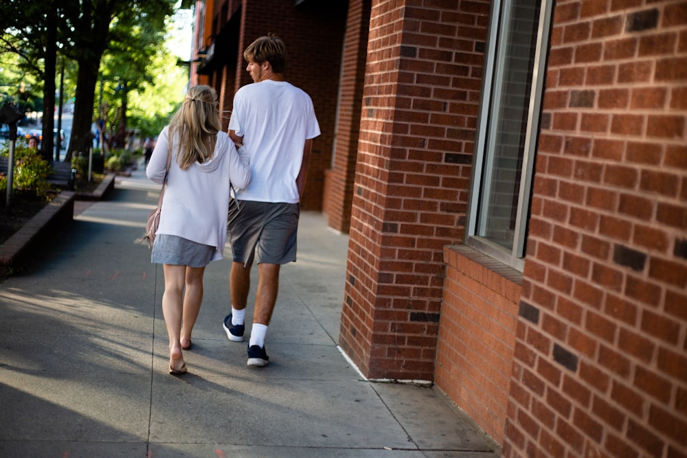 couple walking in hallway