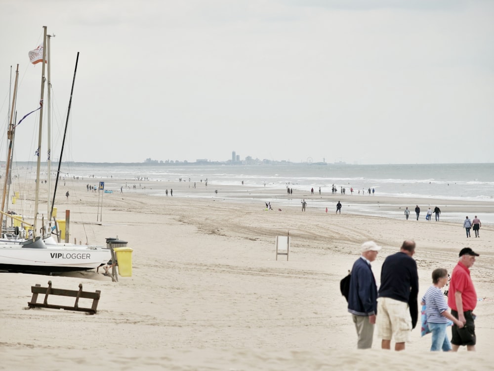 people standing near body of water