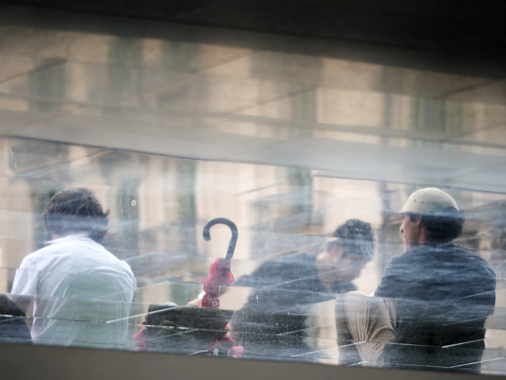 a group of people sitting next to each other