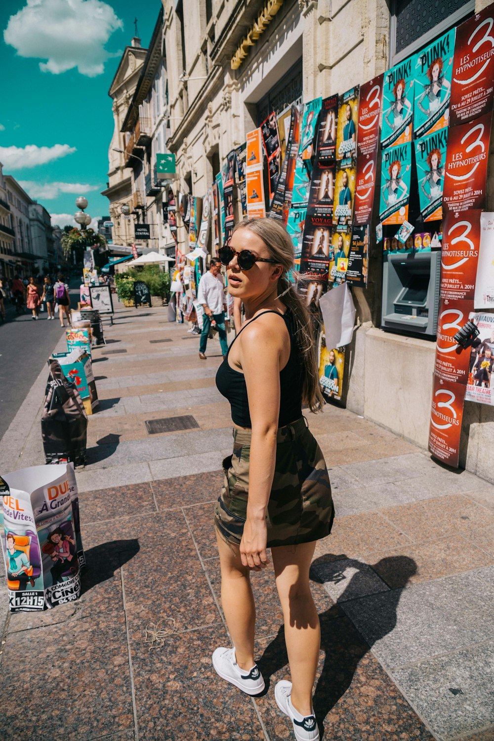 woman walking in sidewalk