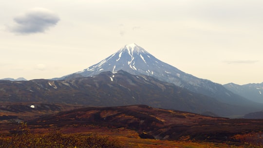 brown mountains under white sky during daytime in Kamchatka Krai Russia