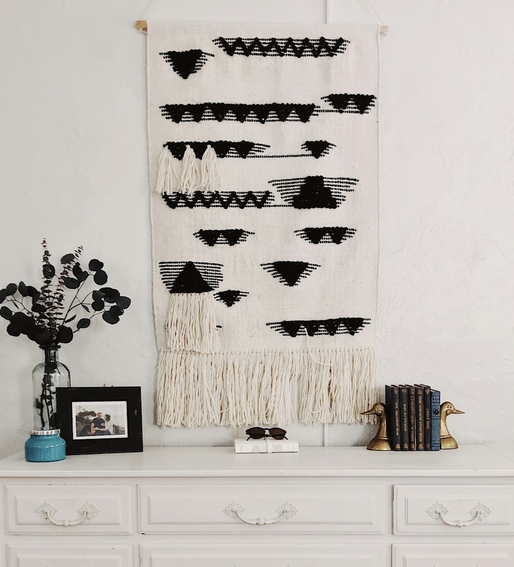 white and black string tapestry
