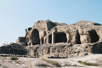 The Lycian rock tombs cut into the cliff above the river at Dalyan
