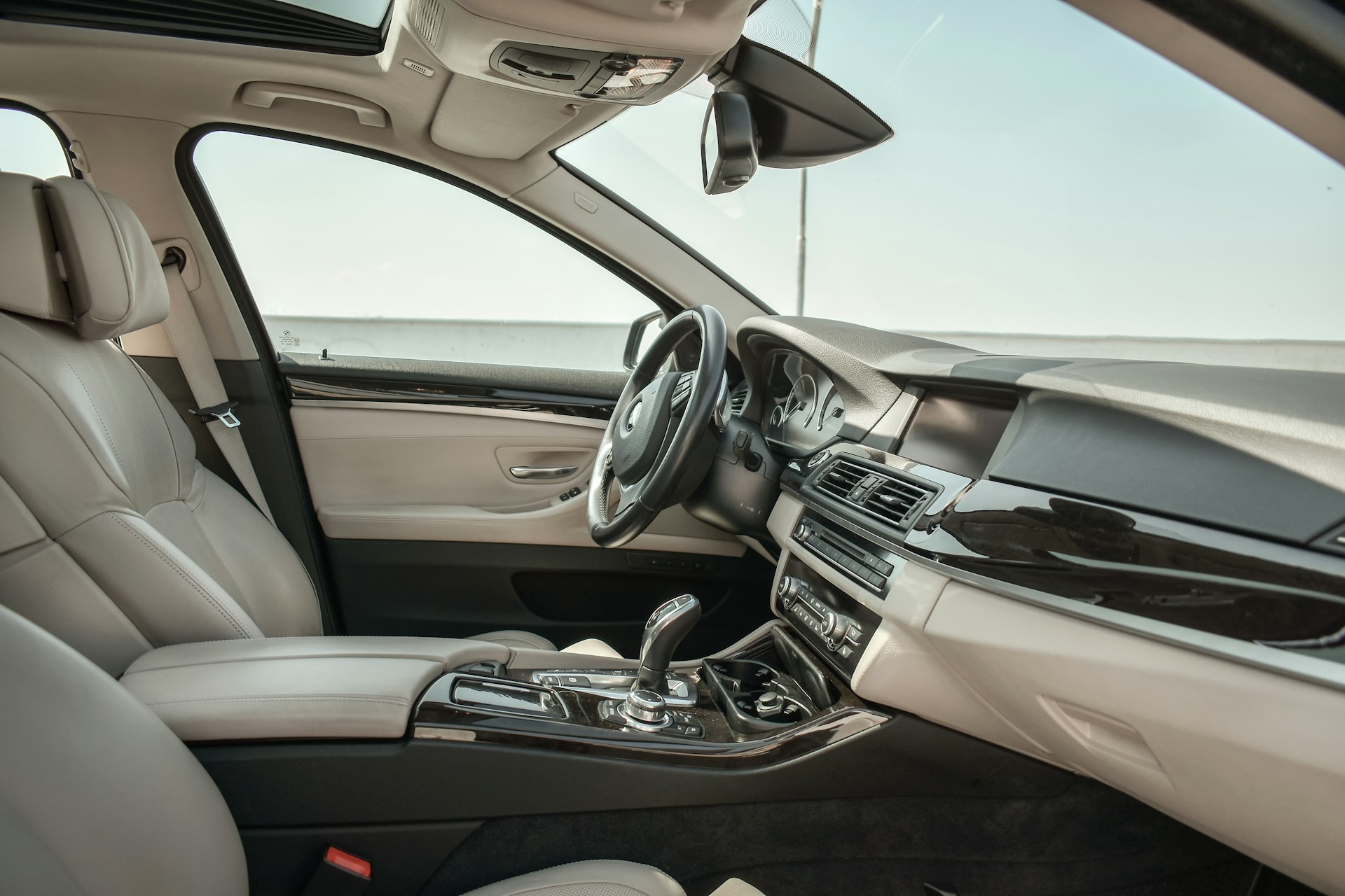 woman wearing yellow long-sleeved dress under white clouds and blue sky during daytime