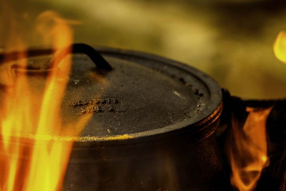 closeup photography of black metal pot