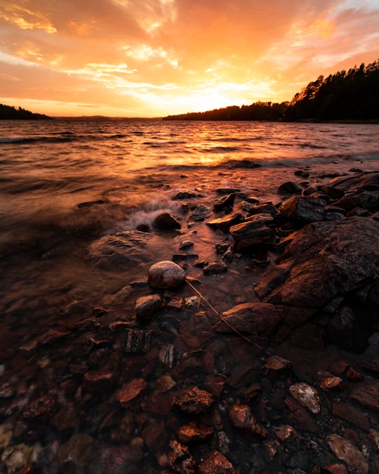 body of water during golden hour in Trollhättan Sweden