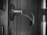 Close-up of a sturdy steel door with a modern handle in a residential setting.