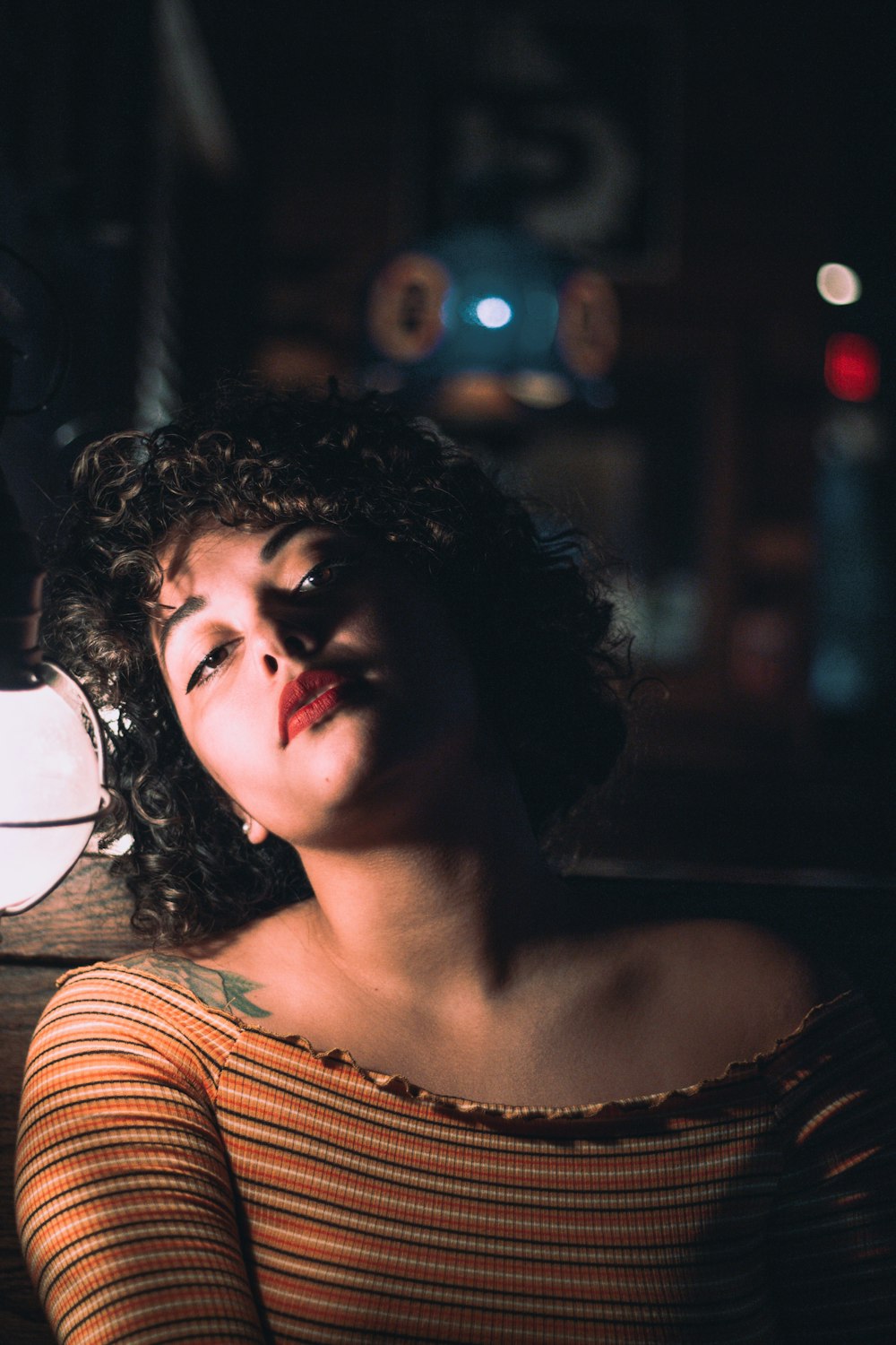 woman leaning on wall