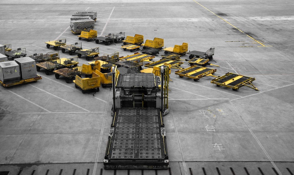 parked yellow heavy equipments