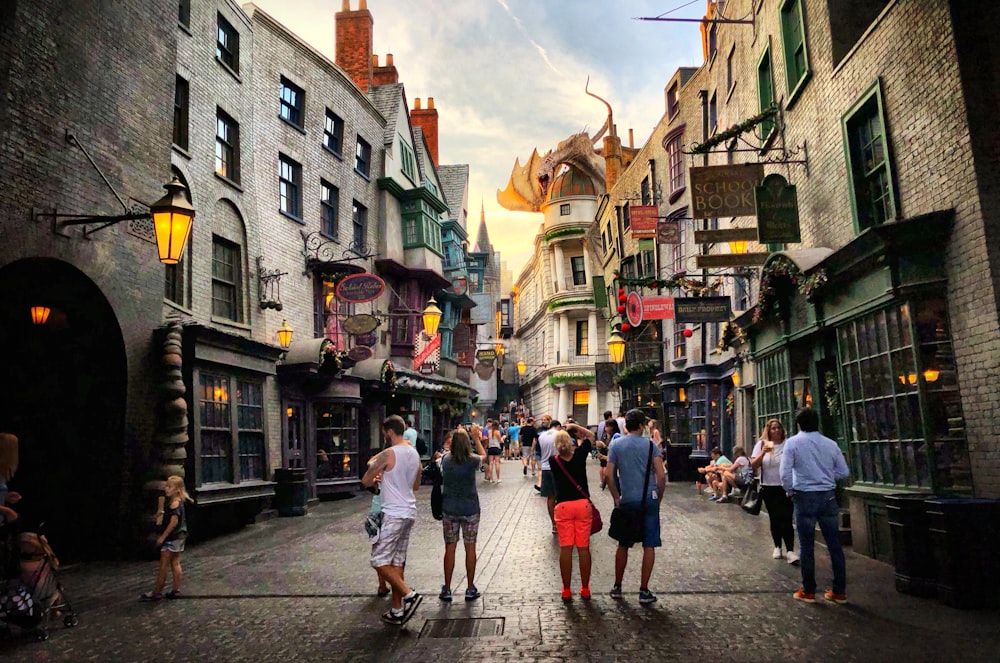 people standing and walking near buildings