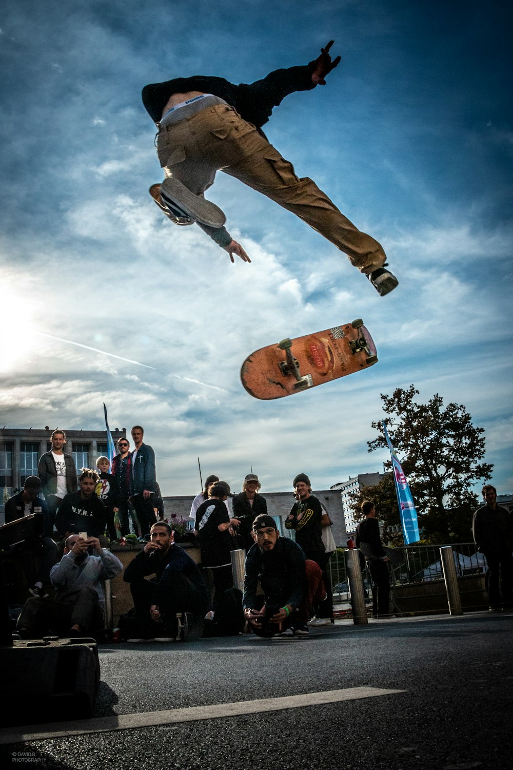 man skateboarding doing tricks on air
