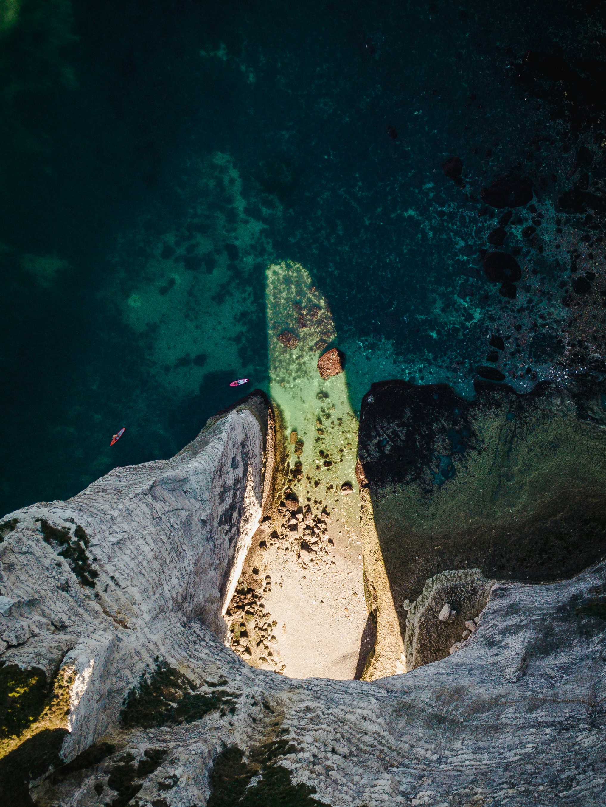 top view photo of seashore near blue body of water