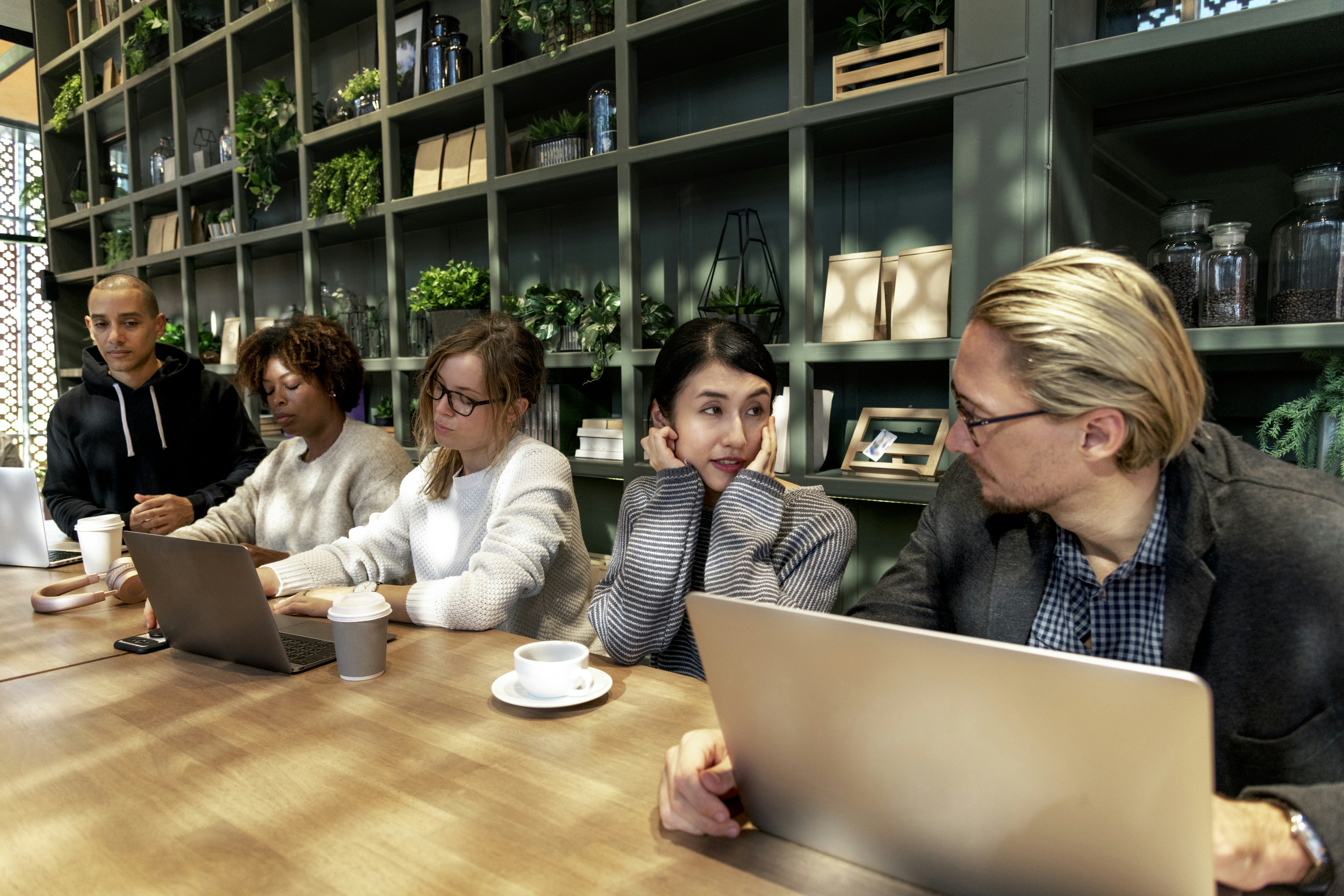 People working together while sitting at the table