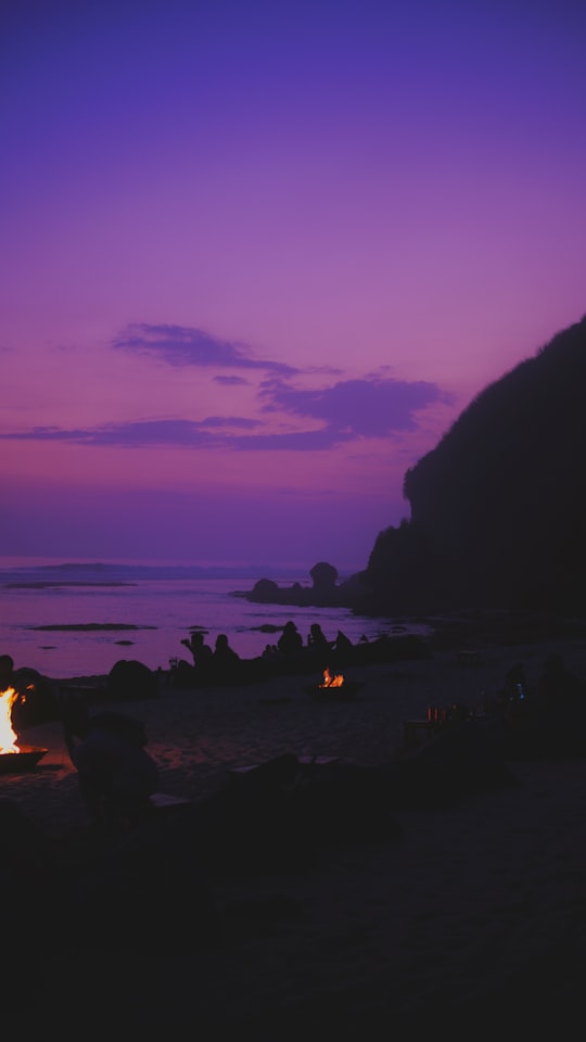 person near campfire in Uluwatu Indonesia