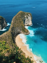 aerial photography of cliff near shore