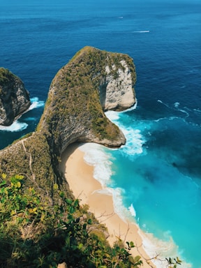 aerial photography of cliff near shore