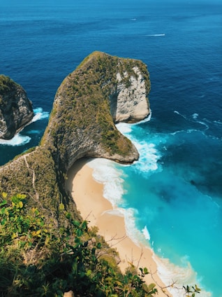 aerial photography of cliff near shore