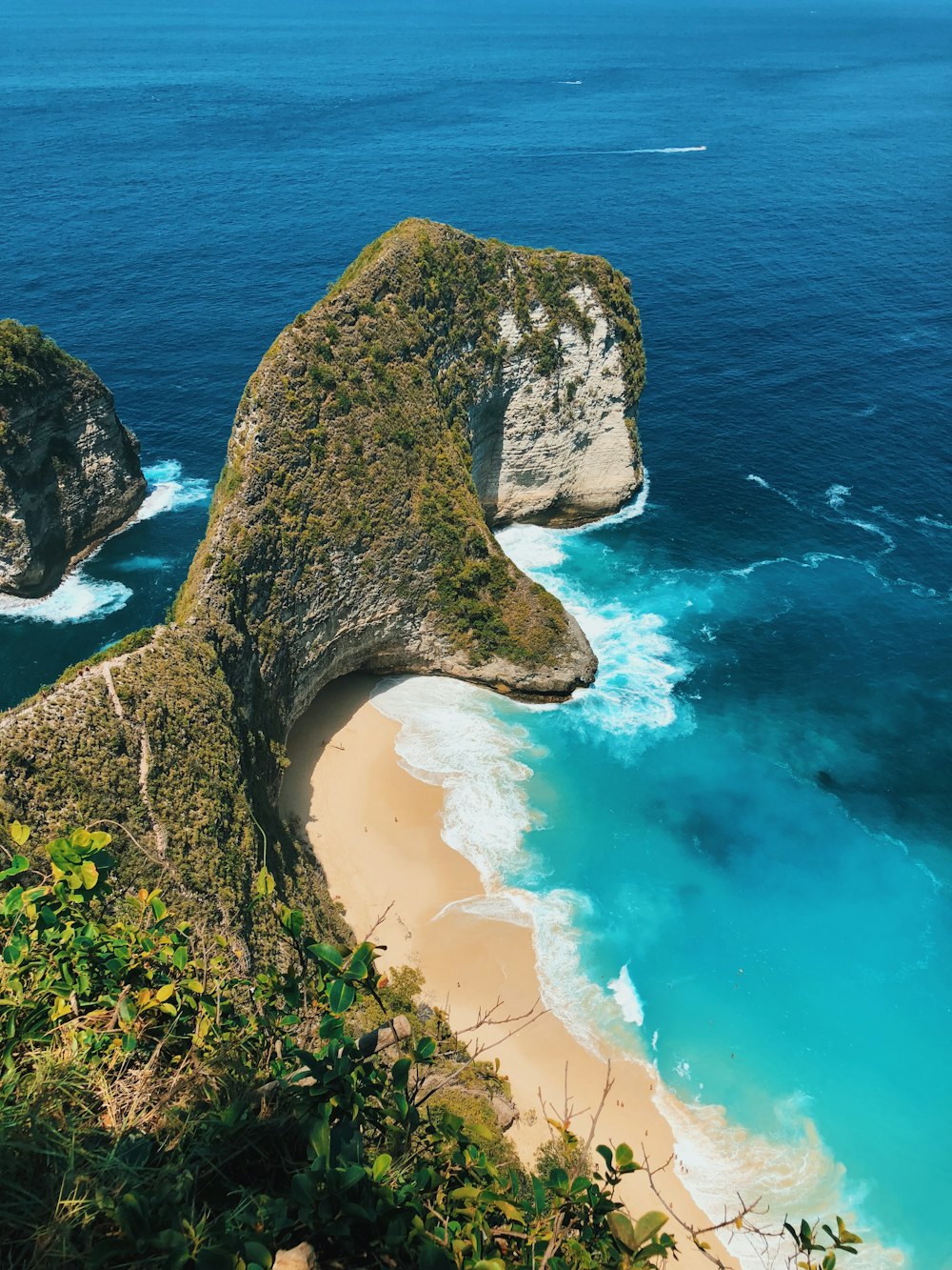 aerial photography of cliff near shore