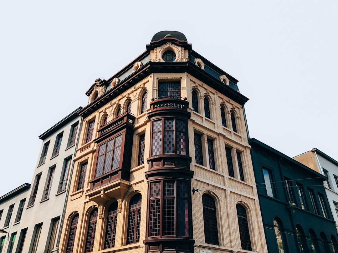 architectural photography of green and beige house