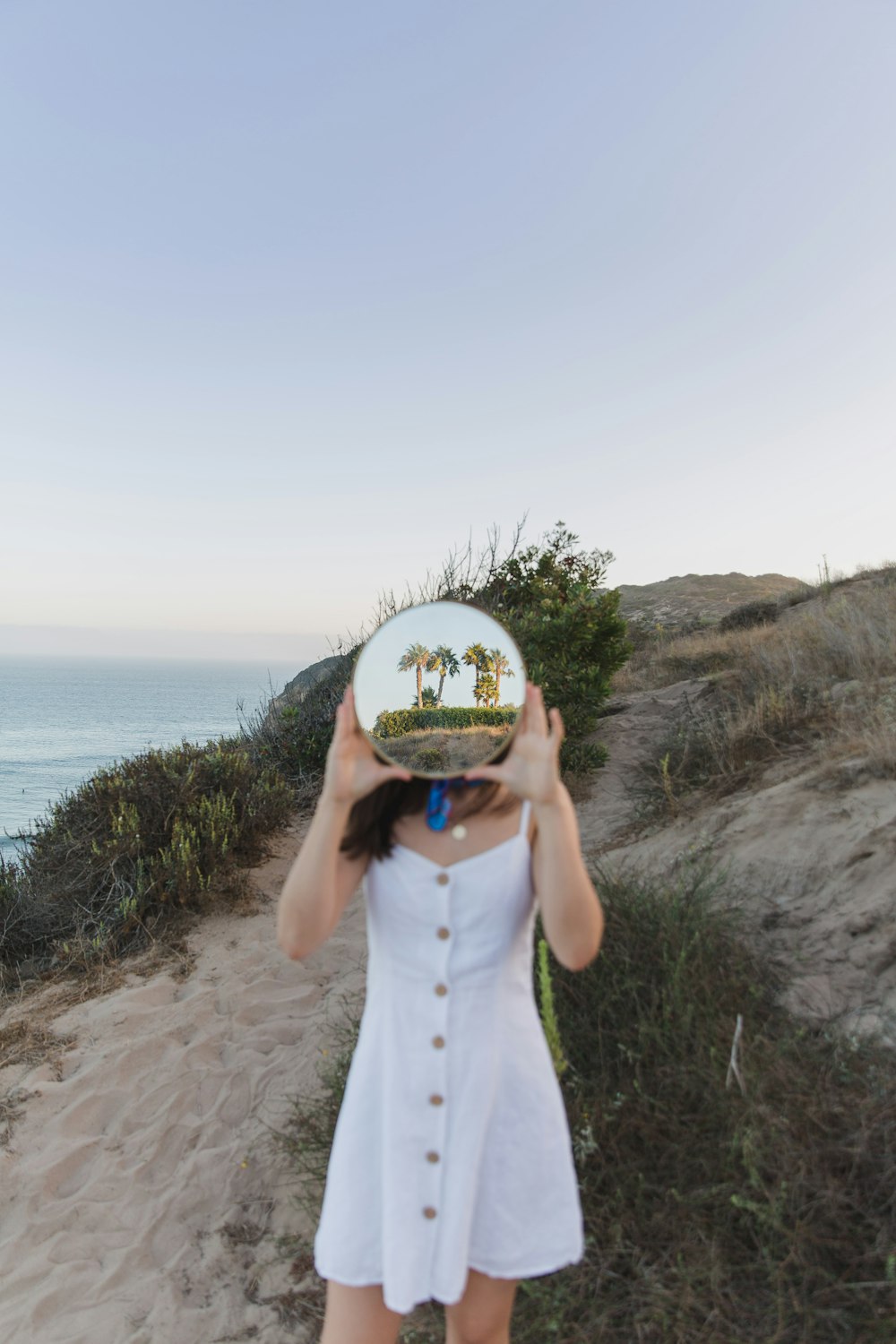 woman holding decorative plate