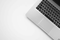 MacBook Pro on white surface